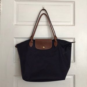 Classic Longchamp “Large Le Pliage” tote in purple